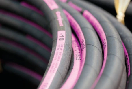 bulk hydraulic hoses coiled neatly.